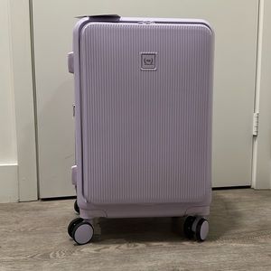 21” Carry-on luggage with front pocket